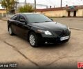 Черный Тойота Камри, объемом двигателя 3.5 л и пробегом 300 тыс. км за 6750 $, фото 1 на Automoto.ua