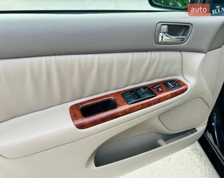 Черный Тойота Камри, объемом двигателя 3 л и пробегом 195 тыс. км за 6900 $, фото 14 на Automoto.ua