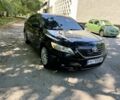 Черный Тойота Камри, объемом двигателя 3.5 л и пробегом 265 тыс. км за 6708 $, фото 1 на Automoto.ua