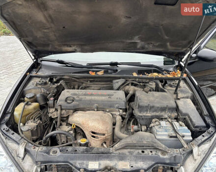 Чорний Тойота Камрі, об'ємом двигуна 2.36 л та пробігом 294 тис. км за 5100 $, фото 15 на Automoto.ua