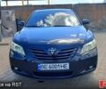 Черный Тойота Камри, объемом двигателя 3.5 л и пробегом 280 тыс. км за 7000 $, фото 1 на Automoto.ua