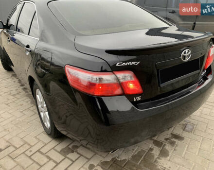 Черный Тойота Камри, объемом двигателя 3.5 л и пробегом 325 тыс. км за 7999 $, фото 8 на Automoto.ua