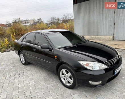 Чорний Тойота Камрі, об'ємом двигуна 2.36 л та пробігом 294 тис. км за 5100 $, фото 4 на Automoto.ua