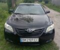 Чорний Тойота Камрі, об'ємом двигуна 2.4 л та пробігом 243 тис. км за 6999 $, фото 1 на Automoto.ua