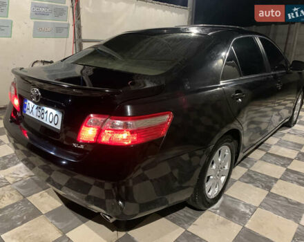 Черный Тойота Камри, объемом двигателя 3.5 л и пробегом 325 тыс. км за 7999 $, фото 68 на Automoto.ua