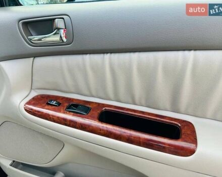 Черный Тойота Камри, объемом двигателя 3 л и пробегом 195 тыс. км за 6900 $, фото 19 на Automoto.ua