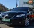 Черный Тойота Камри, объемом двигателя 2.36 л и пробегом 318 тыс. км за 7999 $, фото 1 на Automoto.ua