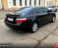 Черный Тойота Камри, объемом двигателя 3.5 л и пробегом 300 тыс. км за 6750 $, фото 4 на Automoto.ua