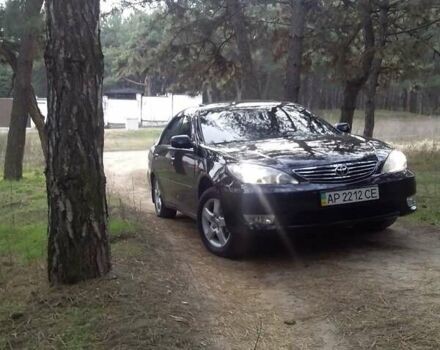 Чорний Тойота Камрі, об'ємом двигуна 2.36 л та пробігом 270 тис. км за 6100 $, фото 6 на Automoto.ua