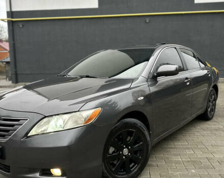 Черный Тойота Камри, объемом двигателя 2.4 л и пробегом 350 тыс. км за 6500 $, фото 1 на Automoto.ua