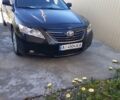 Черный Тойота Камри, объемом двигателя 2.4 л и пробегом 404 тыс. км за 7500 $, фото 1 на Automoto.ua