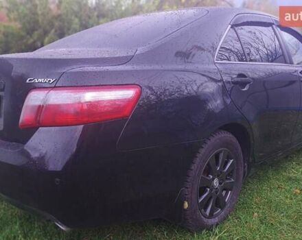 Черный Тойота Камри, объемом двигателя 2.36 л и пробегом 230 тыс. км за 10000 $, фото 5 на Automoto.ua