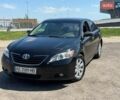 Черный Тойота Камри, объемом двигателя 2.36 л и пробегом 252 тыс. км за 6650 $, фото 1 на Automoto.ua