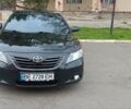 Черный Тойота Камри, объемом двигателя 3.5 л и пробегом 300 тыс. км за 10400 $, фото 1 на Automoto.ua