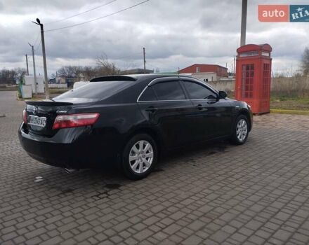Черный Тойота Камри, объемом двигателя 2.4 л и пробегом 190 тыс. км за 11500 $, фото 7 на Automoto.ua