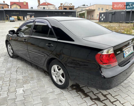 Чорний Тойота Камрі, об'ємом двигуна 2.36 л та пробігом 294 тис. км за 5100 $, фото 9 на Automoto.ua