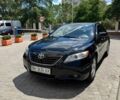 Черный Тойота Камри, объемом двигателя 2.4 л и пробегом 368 тыс. км за 5500 $, фото 1 на Automoto.ua