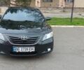 Чорний Тойота Камрі, об'ємом двигуна 3.5 л та пробігом 300 тис. км за 11000 $, фото 1 на Automoto.ua