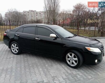 Чорний Тойота Камрі, об'ємом двигуна 2.4 л та пробігом 288 тис. км за 7700 $, фото 10 на Automoto.ua
