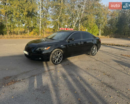Черный Тойота Камри, объемом двигателя 3.46 л и пробегом 337 тыс. км за 9000 $, фото 1 на Automoto.ua