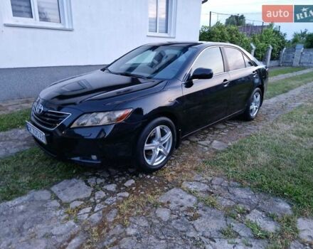 Чорний Тойота Камрі, об'ємом двигуна 2.36 л та пробігом 299 тис. км за 8888 $, фото 1 на Automoto.ua