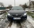 Чорний Тойота Камрі, об'ємом двигуна 2.4 л та пробігом 184 тис. км за 7700 $, фото 1 на Automoto.ua