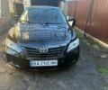 Чорний Тойота Камрі, об'ємом двигуна 2.4 л та пробігом 277 тис. км за 8700 $, фото 1 на Automoto.ua