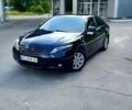 Черный Тойота Камри, объемом двигателя 2.4 л и пробегом 300 тыс. км за 7800 $, фото 1 на Automoto.ua