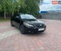 Чорний Тойота Камрі, об'ємом двигуна 2.4 л та пробігом 348 тис. км за 5300 $, фото 1 на Automoto.ua
