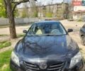 Черный Тойота Камри, объемом двигателя 2.4 л и пробегом 243 тыс. км за 8200 $, фото 1 на Automoto.ua