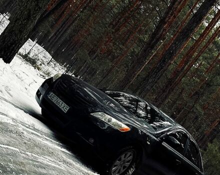 Черный Тойота Камри, объемом двигателя 2.4 л и пробегом 212 тыс. км за 9500 $, фото 1 на Automoto.ua