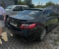 Черный Тойота Камри, объемом двигателя 2.4 л и пробегом 300 тыс. км за 4800 $, фото 1 на Automoto.ua