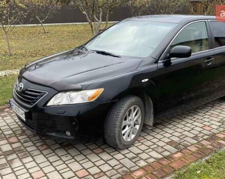Черный Тойота Камри, объемом двигателя 2.4 л и пробегом 227 тыс. км за 8600 $, фото 6 на Automoto.ua