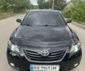 Чорний Тойота Камрі, об'ємом двигуна 2.4 л та пробігом 197 тис. км за 7999 $, фото 1 на Automoto.ua