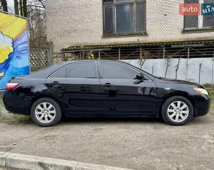 Черный Тойота Камри, объемом двигателя 2.4 л и пробегом 313 тыс. км за 6950 $, фото 1 на Automoto.ua