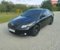 Черный Тойота Камри, объемом двигателя 2.4 л и пробегом 266 тыс. км за 6700 $, фото 1 на Automoto.ua