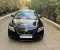 Чорний Тойота Камрі, об'ємом двигуна 2.4 л та пробігом 350 тис. км за 6399 $, фото 1 на Automoto.ua