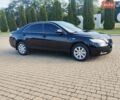 Черный Тойота Камри, объемом двигателя 2.4 л и пробегом 293 тыс. км за 8400 $, фото 1 на Automoto.ua