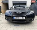 Черный Тойота Камри, объемом двигателя 2.36 л и пробегом 174 тыс. км за 8900 $, фото 1 на Automoto.ua