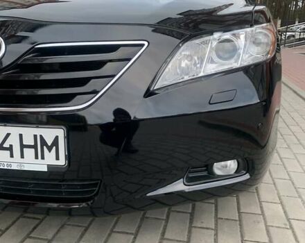 Черный Тойота Камри, объемом двигателя 3.46 л и пробегом 233 тыс. км за 10500 $, фото 1 на Automoto.ua