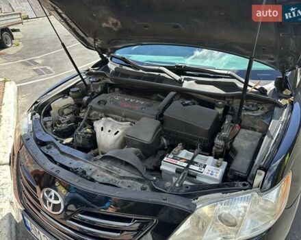 Черный Тойота Камри, объемом двигателя 2.4 л и пробегом 306 тыс. км за 10500 $, фото 4 на Automoto.ua