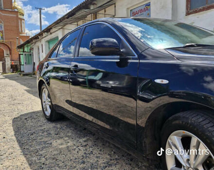 Черный Тойота Камри, объемом двигателя 2.4 л и пробегом 211 тыс. км за 7700 $, фото 1 на Automoto.ua