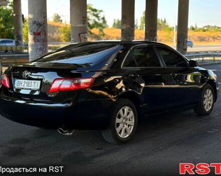 Черный Тойота Камри, объемом двигателя 2.4 л и пробегом 140 тыс. км за 8000 $, фото 1 на Automoto.ua