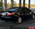 Черный Тойота Камри, объемом двигателя 2.4 л и пробегом 140 тыс. км за 8000 $, фото 1 на Automoto.ua