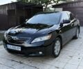 Черный Тойота Камри, объемом двигателя 2.4 л и пробегом 244 тыс. км за 7969 $, фото 1 на Automoto.ua