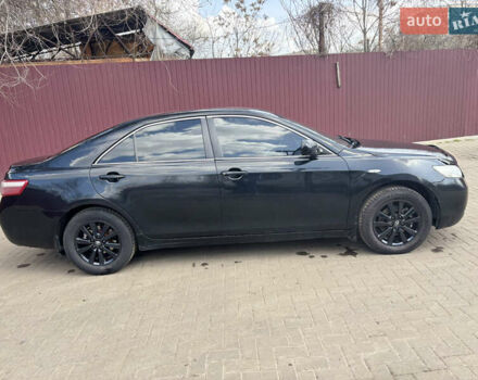 Черный Тойота Камри, объемом двигателя 2.36 л и пробегом 320 тыс. км за 7000 $, фото 1 на Automoto.ua