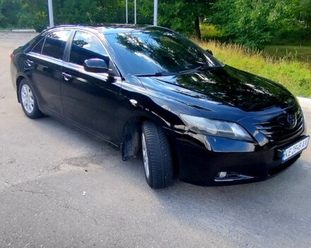 Черный Тойота Камри, объемом двигателя 2.4 л и пробегом 300 тыс. км за 7800 $, фото 1 на Automoto.ua