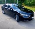 Черный Тойота Камри, объемом двигателя 2.4 л и пробегом 300 тыс. км за 7800 $, фото 1 на Automoto.ua