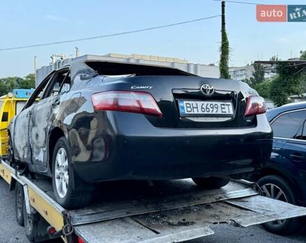 Черный Тойота Камри, объемом двигателя 2.4 л и пробегом 61 тыс. км за 999 $, фото 1 на Automoto.ua