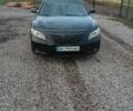 Черный Тойота Камри, объемом двигателя 2.4 л и пробегом 335 тыс. км за 6900 $, фото 1 на Automoto.ua